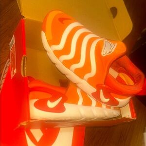 Nike Orange and White Sneakers with Dynamic Design